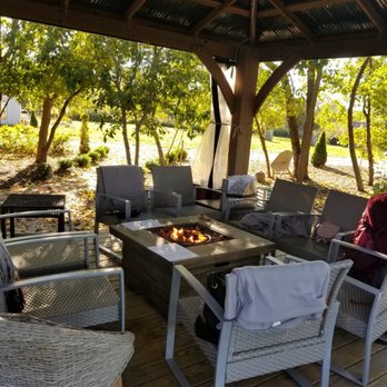 Mattebella Vineyards - a patio with a fire pit - Wineries Near Me - Southold, New York Mattebella Vineyards - a patio with a fire pit - Wineries Near Me - Southold, New York