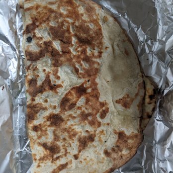 Milanu's Tandoori Grill - Garlic naan folded up - Indian Near Me - Pickering, Ontario Milanu's Tandoori Grill - Garlic naan folded up - Indian Near Me - Pickering, Ontario