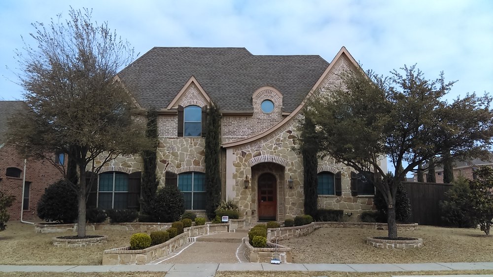 Slide of Reveles Roofing