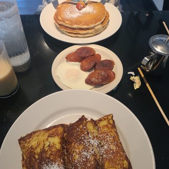 Sweet E's Cafe - Pancakes with side egg and Portuguese sausage, and blueberry-stuffed french toast. - Cafes Near Me - Honolulu, Hawaii Sweet E's Cafe - Pancakes with side egg and Portuguese sausage, and blueberry-stuffed french toast. - Cafes Near Me - Honolulu, Hawaii
