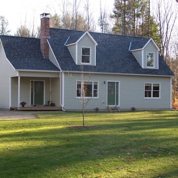 TB Construction - a house with a car parked in front of it - General Contractors Near Me - Orwell, Vermont