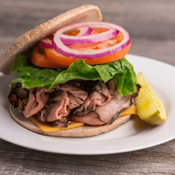 Lean Lifestyle - Roast Beef Sandwich - Sliced Roast Beef, low-fat cheese, tomato and romaine lettuce served on low-carb whole grain sandwich thins.