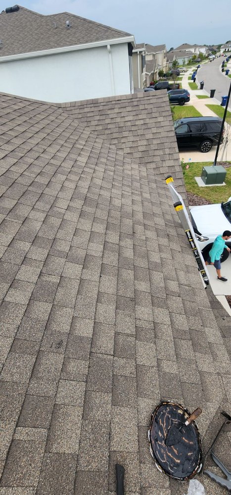 Slide of Red Pros Roofing