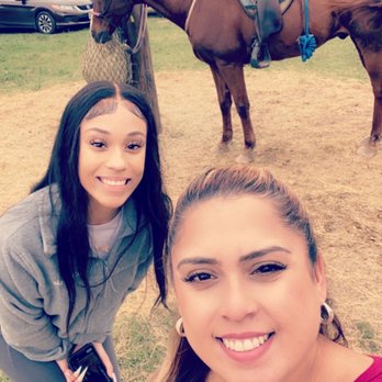Cypress Trails Ranch - Feeding the horses after our ride. - Horseback Riding Near Me - Humble, Texas Cypress Trails Ranch - Feeding the horses after our ride. - Horseback Riding Near Me - Humble, Texas