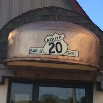 Route 20 Bar & Grill - a man taking a picture - Bars Near Me - Freeport, Illinois Route 20 Bar & Grill - a man taking a picture - Bars Near Me - Freeport, Illinois