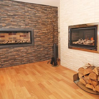 Simon Turner Showrooms - Inside our Wood Burning Stove, Fire, Fireplace and Surrounds Showroom - Heating & Air Conditioning/HVAC Near Me - Exmouth, DEV Simon Turner Showrooms - Inside our Wood Burning Stove, Fire, Fireplace and Surrounds Showroom - Heating & Air Conditioning/HVAC Near Me - Exmouth, DEV