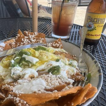 Chuponcito - I had to take a few bites before taking this shot (Chilequiles + Michelada). - Mexican Near Me - Aliso Viejo, California Chuponcito - I had to take a few bites before taking this shot (Chilequiles + Michelada). - Mexican Near Me - Aliso Viejo, California
