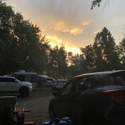 Gracies Canoe Camp - Sunset over the swim beach from the fire pit by our cabin.