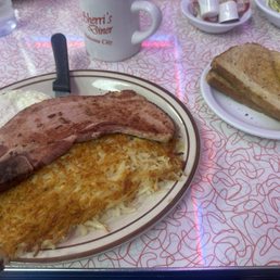Country Ham Steak, eggs over easy, hash browns & rye toast Country Ham Steak, eggs over easy, hash browns & rye toast