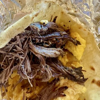 HomeState - Close-up of the slow-cooked brisket; tender and packed with flavor. - Breakfast & Brunch Near Me - Sherman Oaks, California