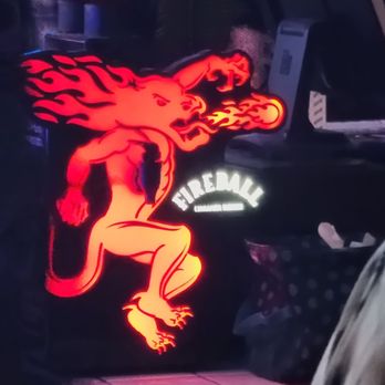Backseat Bar & Grill - a neon sign of a fireman - American Near Me - Winchester, Virginia Backseat Bar & Grill - a neon sign of a fireman - American Near Me - Winchester, Virginia
