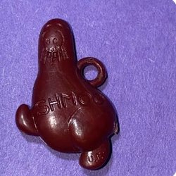 Bo Kay Florist & Memories Antiques - Shmoo cracker jack charm