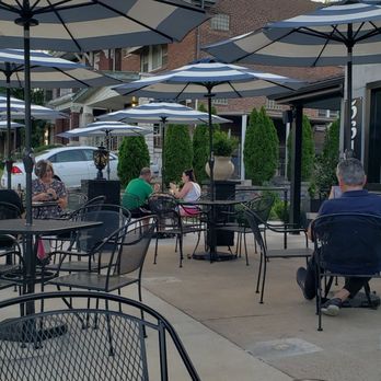Cafe Nova - people sitting at tables with umbrellas - Coffee & Tea Near Me - Saint Louis, Missouri Cafe Nova - people sitting at tables with umbrellas - Coffee & Tea Near Me - Saint Louis, Missouri
