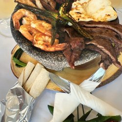 Salsa Grill - This dish is a dish you absolutely have to try.Called the "Molcajete."Comes with streak, chicken, ranchero cheese, chorizo, shrimp! The best