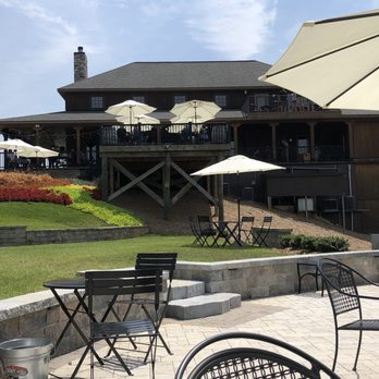 Saudé Creek Vineyards - View from the back lawn seats. The wraparound porch has lots of tables and fans! - Wineries Near Me - Lanexa, Virginia Saudé Creek Vineyards - View from the back lawn seats. The wraparound porch has lots of tables and fans! - Wineries Near Me - Lanexa, Virginia