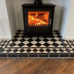 A Clean Sweep - beautiful wood burning stove