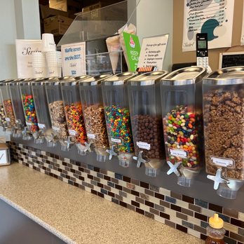 The Swirl - a row of candy dispensers on a counter - Ice Cream & Frozen Yogurt Near Me - North Bend, Washington The Swirl - a row of candy dispensers on a counter - Ice Cream & Frozen Yogurt Near Me - North Bend, Washington