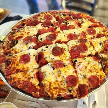 Riverside Pizza & Pub - Supreme pizza - Pizza Near Me - Batavia, Illinois Riverside Pizza & Pub - Supreme pizza - Pizza Near Me - Batavia, Illinois