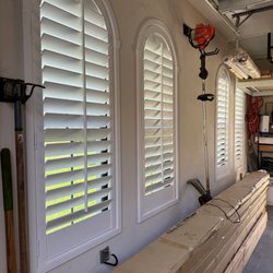 Architectural Plantation Shutters - Custom arched plantation shutters built for a specialty garage window in Palm Beach, FL.