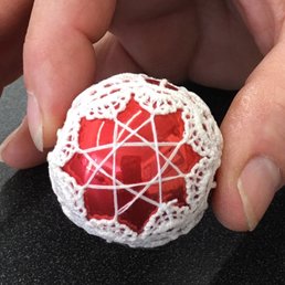 Ornaments made with bits of lace- on sale seasonally at the museum Ornaments made with bits of lace- on sale seasonally at the museum