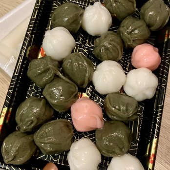 Ga Yeon Rice Cake - a person holding a tray of rice balls - Korean Near Me - Elkins Park, Pennsylvania Ga Yeon Rice Cake - a person holding a tray of rice balls - Korean Near Me - Elkins Park, Pennsylvania