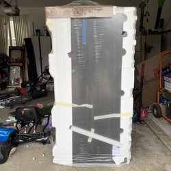 Where the left the new fridge and showing how they didn't put back my current broken fridge.