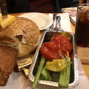 Sammys Fish Box - Round bread loaf, corn bread, cheese, assorted raw veggies on a cutting board. Ice tea. - Seafood Near Me - Bronx, New York Sammys Fish Box - Round bread loaf, corn bread, cheese, assorted raw veggies on a cutting board. Ice tea. - Seafood Near Me - Bronx, New York
