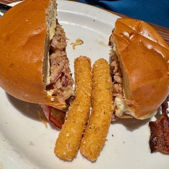 Miller's Ale House - Tush Push burger with mozzarella sticks on the side - Sports Bars Near Me - Boynton Beach, Florida Miller's Ale House - Tush Push burger with mozzarella sticks on the side - Sports Bars Near Me - Boynton Beach, Florida