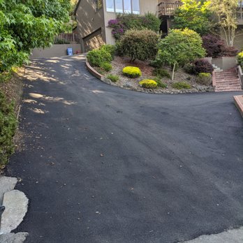 Bay Cities Asphalt - a driveway being cleaned - General Contractors Near Me Bay Cities Asphalt - a driveway being cleaned - General Contractors Near Me