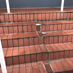 Captain D's - This is a lawsuit just waiting to happen.  Tile on front step are deteriorated, cracked, detached and just laying on step.