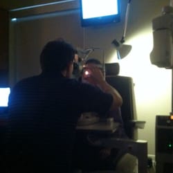 20/20 Eyecare Centers - Our Daughter getting eye exam from Dr Mayes