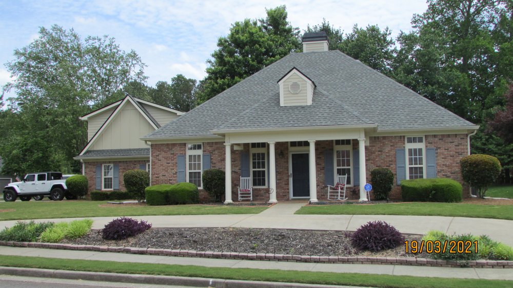 Slide of RedHawk Roofing
