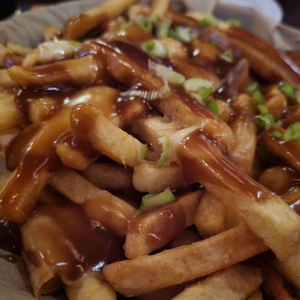 Nolans Irish Pub - Poutine is delish! - Pubs Near Me - Cocoa Beach, Florida Nolans Irish Pub - Poutine is delish! - Pubs Near Me - Cocoa Beach, Florida