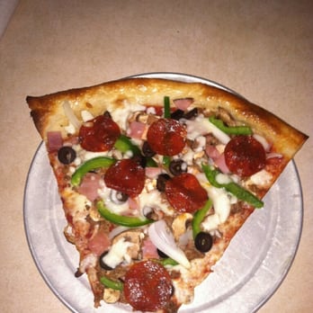 Slice Downtown - Now that's a slice... The Supreme ( yes, the tip has been bit off-lol ) - Pizza Near Me - Atlanta, Georgia Slice Downtown - Now that's a slice... The Supreme ( yes, the tip has been bit off-lol ) - Pizza Near Me - Atlanta, Georgia