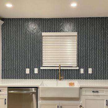 Ideal Custom Tile - a kitchen with a sink and dishwasher - Flooring Near Me Ideal Custom Tile - a kitchen with a sink and dishwasher - Flooring Near Me