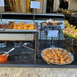 Aspen Catering - Outdoor appetizers featuring our Almond Bacon Crotini, Mini Chicken Cordon Bleu, Antipasto Skewers and Shrimp wrapped in Bacon & Jalapeno