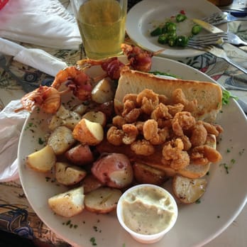 Doc's Seafood & Steaks - Shrimp po'boy with new potatoes and stuffed shrimp added - Seafood Near Me - Corpus Christi, Texas