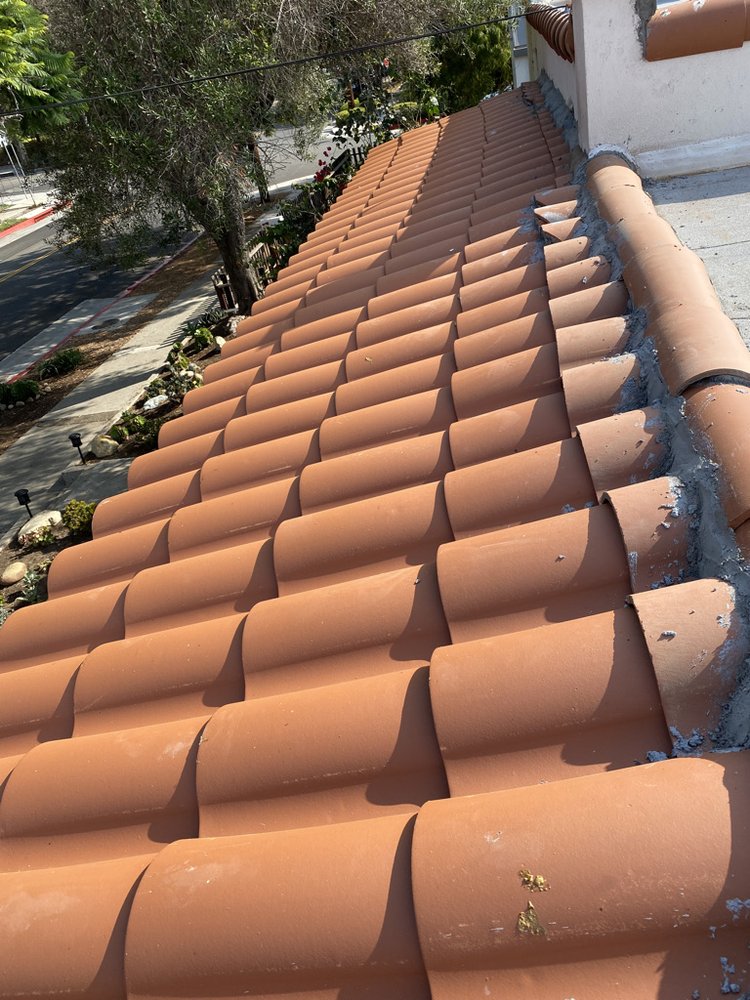 Slide of Titan Roofing & Rain Gutters Inc.