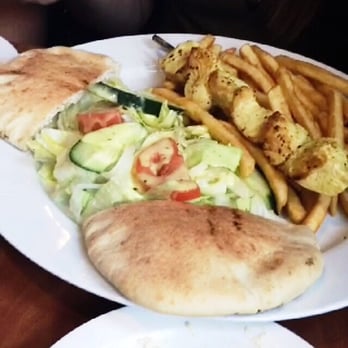 Montfort Restaurant - Chicken souvlaki dinner plate - Mediterranean Near Me - Mississauga, Ontario Montfort Restaurant - Chicken souvlaki dinner plate - Mediterranean Near Me - Mississauga, Ontario