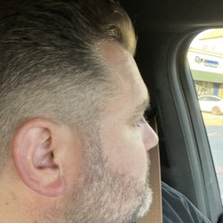$65 plus $10 tip for no beard no straight razor and no shampoo. Just a lot of attitude.