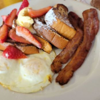 Ariana's Restaurant - a plate of french toast, bacon, strawberries, and eggs - American Near Me - Salinas, California Ariana's Restaurant - a plate of french toast, bacon, strawberries, and eggs - American Near Me - Salinas, California