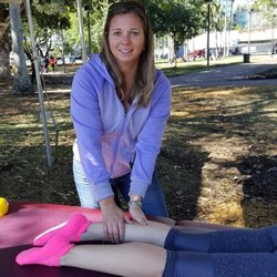 Sheryl Powers, LMT - Powers of Massage - Working at the finish line in a local marathon.