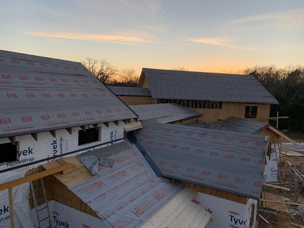 Slide of Yosemite Roofing Longview TX