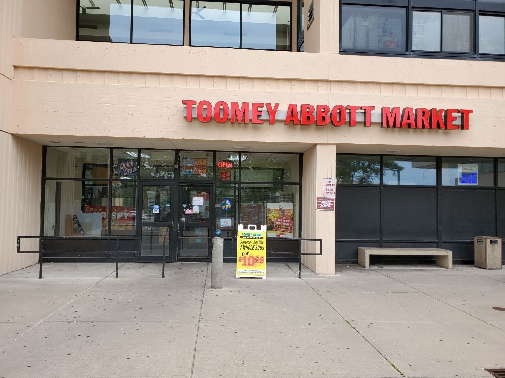 Toomey Abbott market Logo