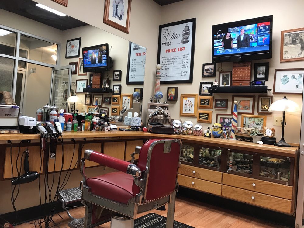 The Elite Barber Shop Logo
