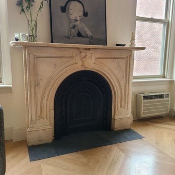 EAGL Construction Group - a fireplace in a living room - General Contractors Near Me - Brooklyn, New York