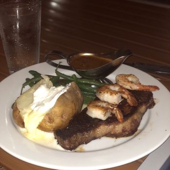 Cedars Floating Restaurant - Peppercorn New York Steak with a skewer of Shrimp Scampi - Seafood Near Me - Coeur D'alene, Idaho