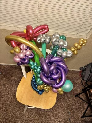 Balloon arch, Flower bouquets and gift baskets - Balloon arch and backdrop for the corporate event. Balloon bouquets for the guests and gift basket with flowers inside bubble for the guest of the honor. Balloon arch, Flower bouquets and gift baskets - Balloon arch and backdrop for the corporate event. Balloon bouquets for the guests and gift basket with flowers inside bubble for the guest of the honor.