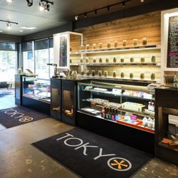 Tokyo Starfish SE 3rd St Cannabis Dispensary - Counter, flower shelf, seating area in TOKYO STARFISH Dispensary SE 3rd St, Bend, OR 97702 location.