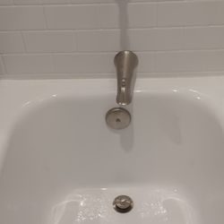 Level Up Baths - Misaligned faucet, overflow and drain. Filed with BBB Dayton.